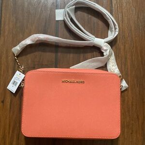 Michael kors jet set crossbody bag pink grapefruit color